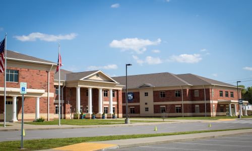 Front of school building from parking lot